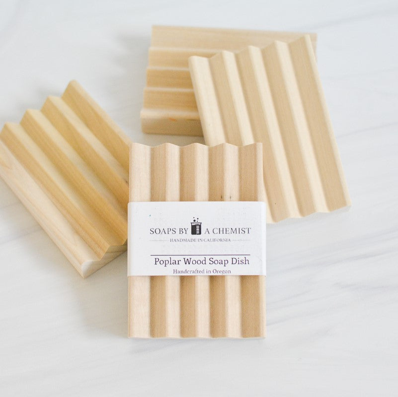 pile of poplar wooden soap dish for bathroom, shower, or kitchen