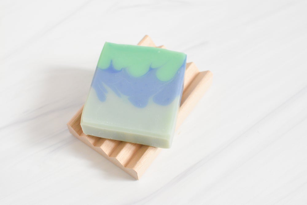 poplar and beech wooden soap dish for bathroom, shower, or kitchen with soap on top