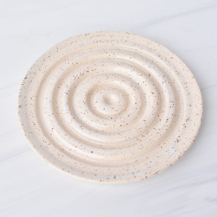 cream white round speckled ceramic soap dish