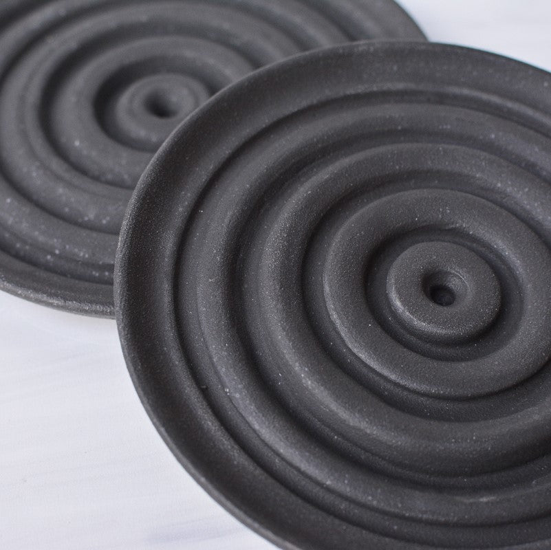 matte black ceramic round soap dish earthen hands ceramics close up